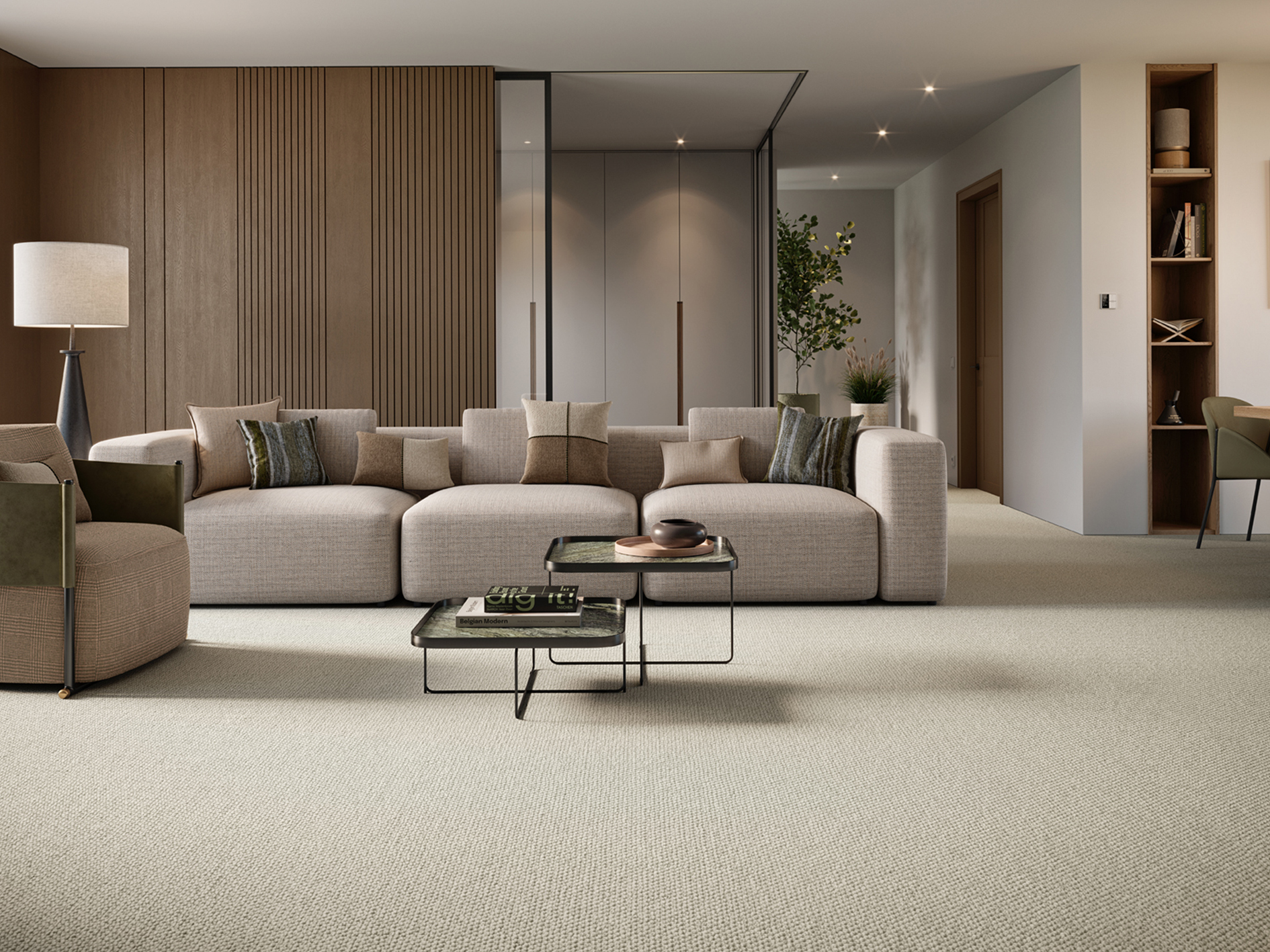 Modern living room with a neutral sofa, wooden panel wall, and light-colored textured carpet.