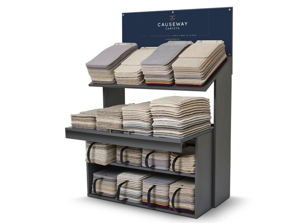 Causeway Carpets Multi Display Unit featuring a selection of carpet samples in neutral colours, designed for independent flooring retailer showrooms.